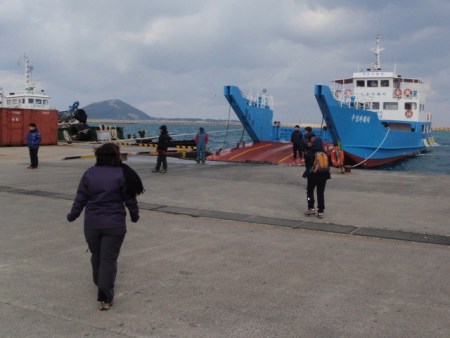 That's the ferry with Udo Island in the background.