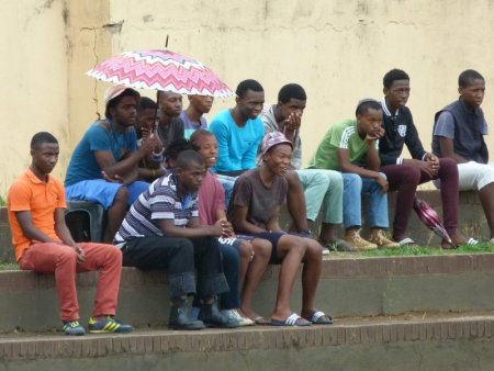 Fans behind the goal.